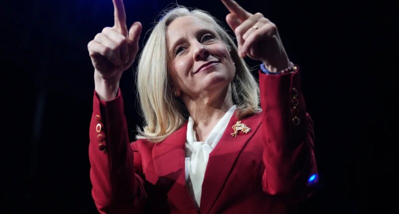 Democrat Abigail Spanberger points out at the crowd after she was declared the winner of the Virginia governor