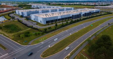 FILE - Cars drive past data centers that house computer servers and hardware required to support modern internet use, such as artificial intelligence, in Ashburn, Virginia, July 16, 2023. (AP Photo/Ted Shaffrey, File)