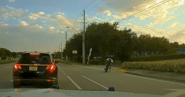 Teen dirt biker rounds corner during high-speed chase with police