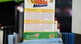 FILE - Mega Millions Lottery play slips are displayed for customers at a convenience store in Chicago, Sunday, April 6, 2025. (AP Photo/Nam Y. Huh, file)