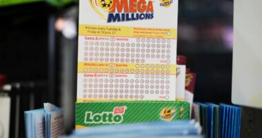 FILE - Mega Millions Lottery play slips are displayed for customers at a convenience store in Chicago, Sunday, April 6, 2025. (AP Photo/Nam Y. Huh, file)