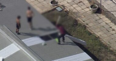 A group of young detainees have climbed to the roof of a building of a detention centre in Perth.