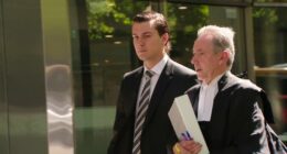 'Our goal is to clear his name': AFL great breaks down in tears after son's rape conviction