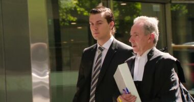 'Our goal is to clear his name': AFL great breaks down in tears after son's rape conviction