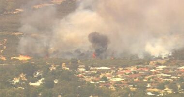 A bushfire burning in Kenwick, in Perth's east.