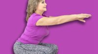beautiful mature woman perform exercise squat in GYM, fitness concept, horizontal photo