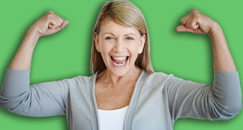 Flexing, portrait and smile with mature woman in studio on gray background for achievement or victory. Arms, bicep and winner with strong person showing muscles for health goal, motivation or success