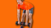 dumbbell deadlift blond man at gym weightlifting with swiss ball background