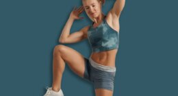 Healthcare creative advertisement concept. Woman fitness coach in the room doing side knee rises.