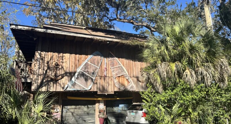 86-year-old Tampa man recalls rescue after he became stranded dangling from roof