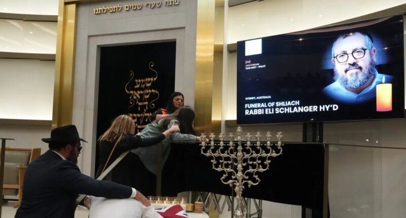 Accused gunman in Bondi Beach shooting charged with 15 counts of murder