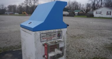 A sharps disposal bin to safely discard used syringes and lancets is installed in Austin, Ind., by the Scott County Health Department Tuesday, Nov. 23, 2025. (AP Photo/Obed Lamy)