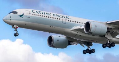 Airline passenger attempted to open plane door in mid-air, authorities say