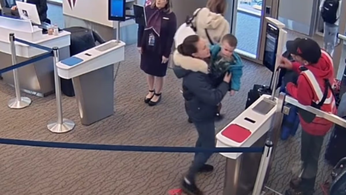 Airport footage shows mother taking four abducted children to Europe