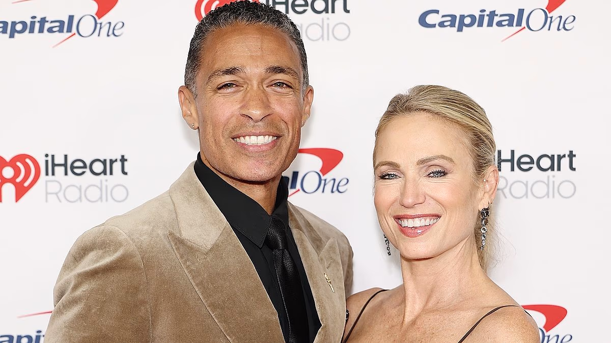 Amy Robach flaunts huge ring as she and T.J. Holmes attend Jingle Ball