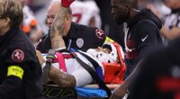 Arizona Cardinals' Andre Baccellia leaves on a stretcher after injuring neck on kickoff return