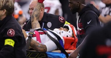 Arizona Cardinals' Andre Baccellia leaves on a stretcher after injuring neck on kickoff return