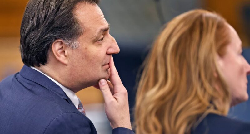 Brian Walshe looks at the jury while seated with his attorney Kelli Porges in Norfolk Superior Court on Monday, Dec. 15, 2025 in Dedham, Mass. (Greg Derr/The Patriot Ledger via AP, Pool)