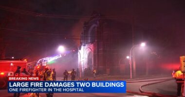 Chicago firefighter, another person injured after West Side church fire spreads to another building at N. Lotus Ave., W. Huron St.