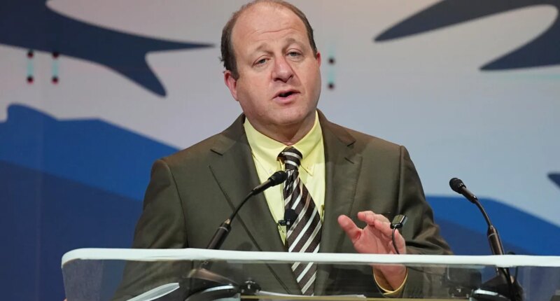 FILE - Colorado Gov. Jared Polis speaks to the National Governors Association at the Broadmoor Hotel in Colorado Springs, Colo., July 25, 2025. (AP Photo/David Zalubowski, File)