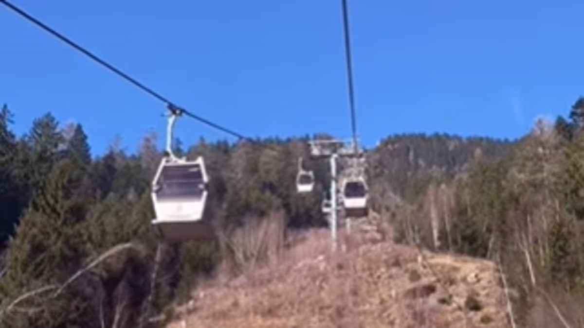 Europe's skiing 'ghost resorts': How hundreds of slopes lie abandoned due to lack of snow as videos show bare mountains