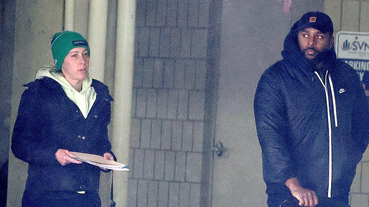 Ex-Michigan coach Sherrone Moore and his wife put on united front