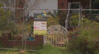 The property is fenced off, after a freak storm left the house plagued with mould.