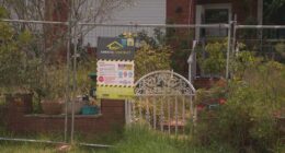 The property is fenced off, after a freak storm left the house plagued with mould.