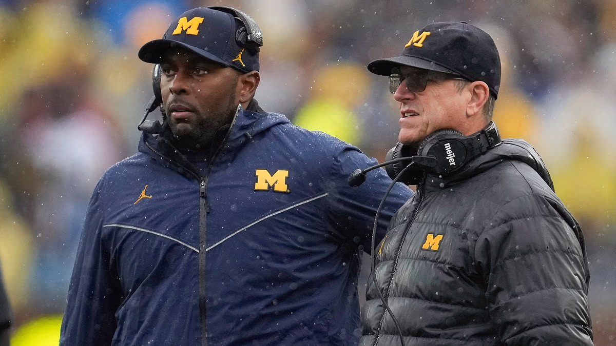 Fired Michigan coach Moore's affair is just the latest scandal