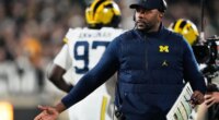 Fired Michigan football coach Sherrone Moore charged with stalking, home invasion