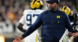 Fired Michigan football coach Sherrone Moore charged with stalking, home invasion