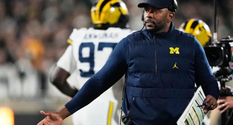 Fired Michigan football coach Sherrone Moore charged with stalking, home invasion