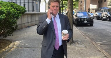 FILE - Acting U.S. Attorney for the Southern District of New York Jay Clayton talks on a phone as he exits court in New York, May 19, 2025. (AP Photo/Ted Shaffrey, File)