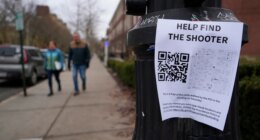 A poster seeking information about the campus shooting suspect is seen on the campus of Brown University, Wednesday, Dec. 17, 2025, in Providence, R.I. (AP Photo/Robert F. Bukaty)