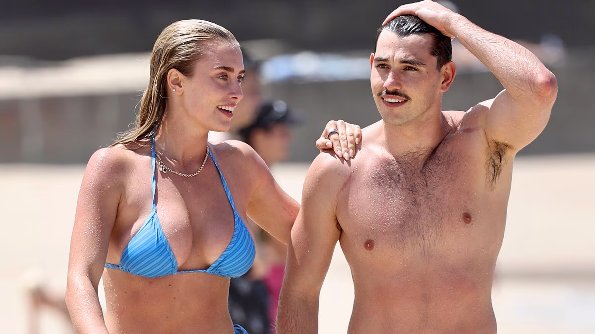 Howzat for a body! Cricket presenter Grace Hayden flaunts her jaw-dropping figure at the beach with boyfriend from a very wealthy family