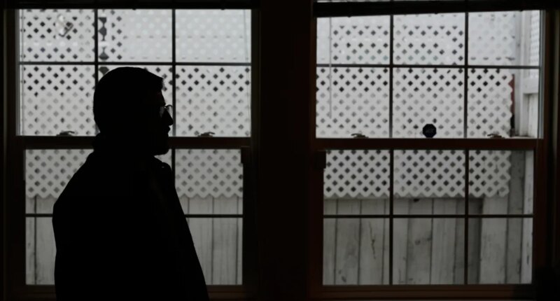 Rohullah R., who did not want his face to be shown or to disclose his last name out of fear of ICE, is photographed at his home in North Highlands, Calif., Friday, Dec. 5, 2025. (AP Photo/Godofredo A. Vásquez)