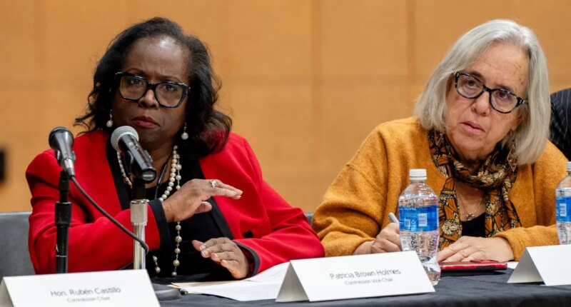 Illinois Accountability Commission Vice Chair Patricia Brown Holmes, left, speaks during the commission