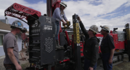 Matthew, Anna, Nathan and Matt Cooper prepare to drill a hole for a geothermal heat pump installation Thursday, Oct. 9, 2025, in Hamilton, Colo. (AP Photo/Brittany Peterson)