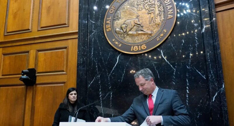 FILE - Indiana Republican House Speaker Todd Huston leaves the podium in the house chamber at the Statehouse, Jan. 8, 2024, in Indianapolis. (AP Photo/Darron Cummings, File)