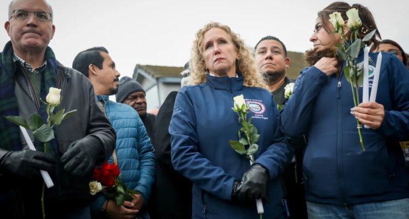 Stockton Mayor Christina Fugazi joins a vigil near the site at Thornton Blvd. and Lucile Ave., where a mass shooting took place Saturday at a banquet hall in Stockton, Calif., Sunday, Nov. 30, 2025. (Brontë Wittpenn/San Francisco Chronicle via AP)