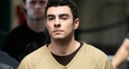 FILE - Luigi Mangione is escorted into Manhattan state court in New York, Sept. 16, 2025. (AP Photo/Seth Wenig, file)