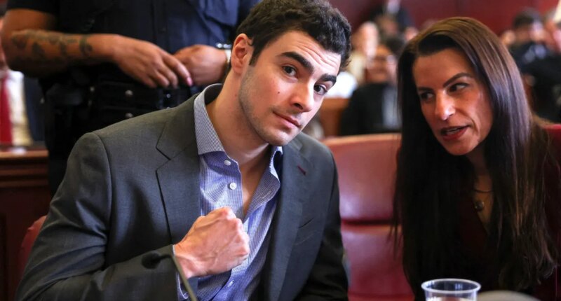 Luigi Mangione pumps fist in court as body cam allegedly reveals loaded magazine found inside wet underwear