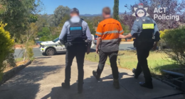 The man allegedly performed two separate Nazi salutes directed towards individuals at suburban Canberra shopping centres.