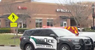 Man killed after firing at police during child custody exchange in quiet North Carolina suburb