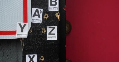 Bullet holes are shown where a mass shooting took place Saturday at a banquet hall in Stockton, Calif., Monday, Dec. 1, 2025. (AP Photo/Jeff Chiu)