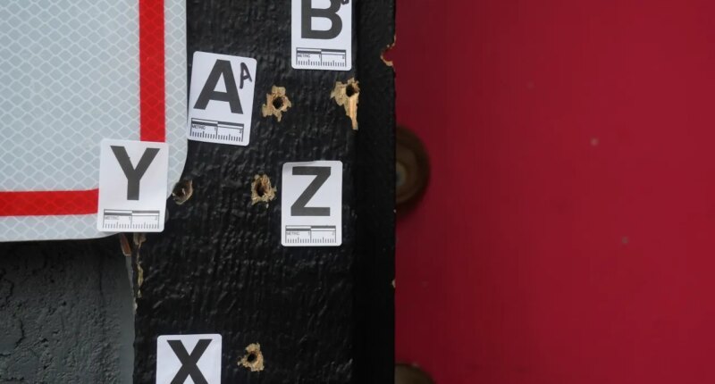 Bullet holes are shown where a mass shooting took place Saturday at a banquet hall in Stockton, Calif., Monday, Dec. 1, 2025. (AP Photo/Jeff Chiu)