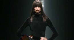 Model on the runway at the Versace Fall RTW 2025 fashion show as part of Milan Fashion Week.