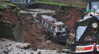 Massive sinkhole in England swallows canal boats