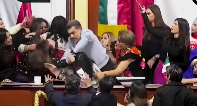 Mexican lawmakers filmed pulling hair and shoving each other during heated Congress floor debate