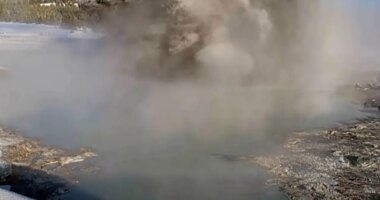 This image made from video provided by the United States Geological Survey (USGS) shows a muddy eruption at Black Diamond Pool in Yellowstone National Park on Saturday, Dec. 20, 2025. (U.S. Geological Survey via AP)